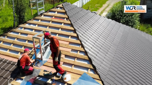 roofers installing roof