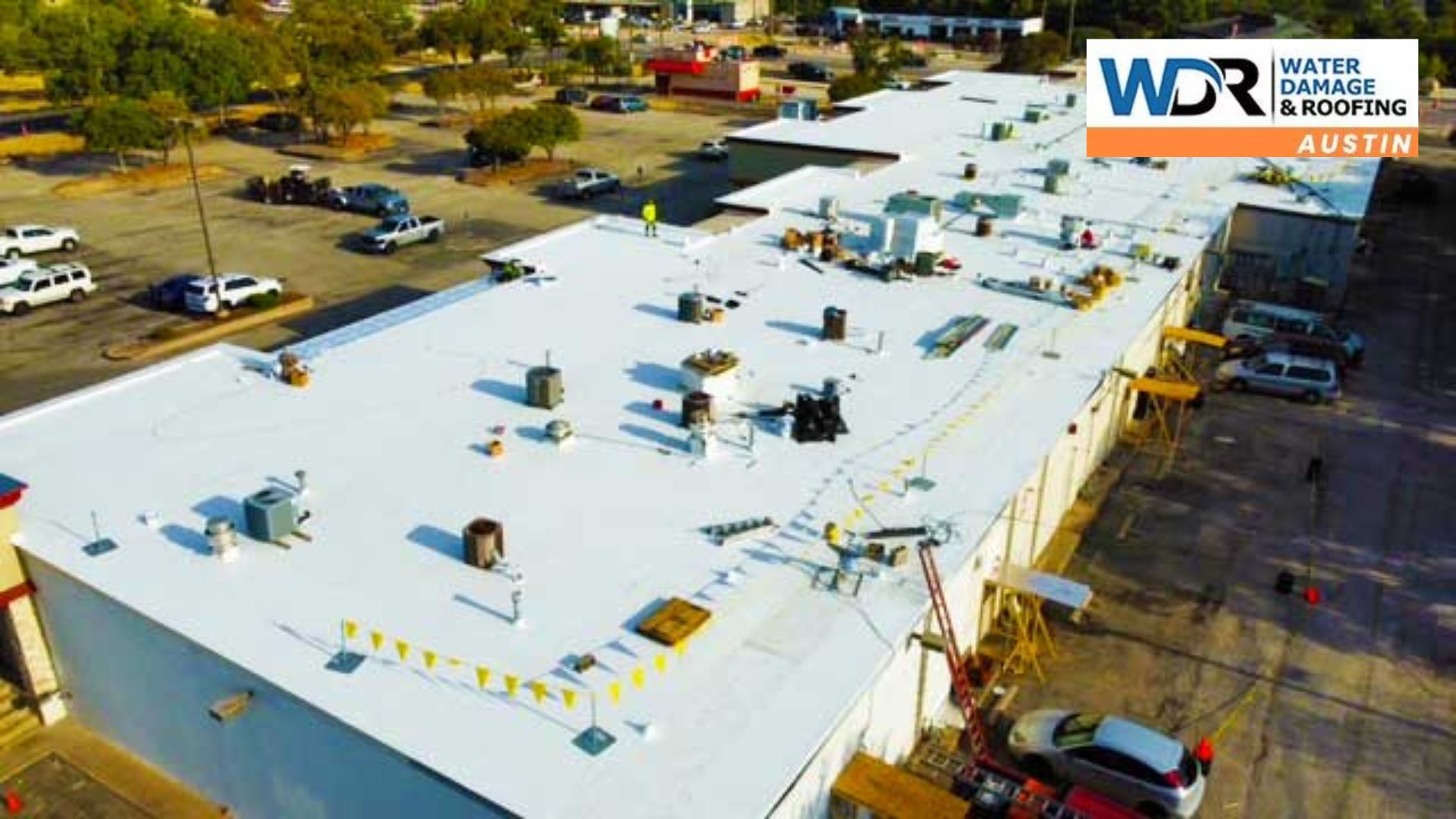 roofing contractors on commercial flat roof