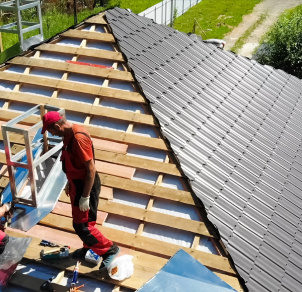 roofers installing roof