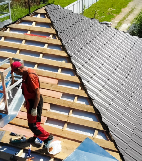 roofers installing roof